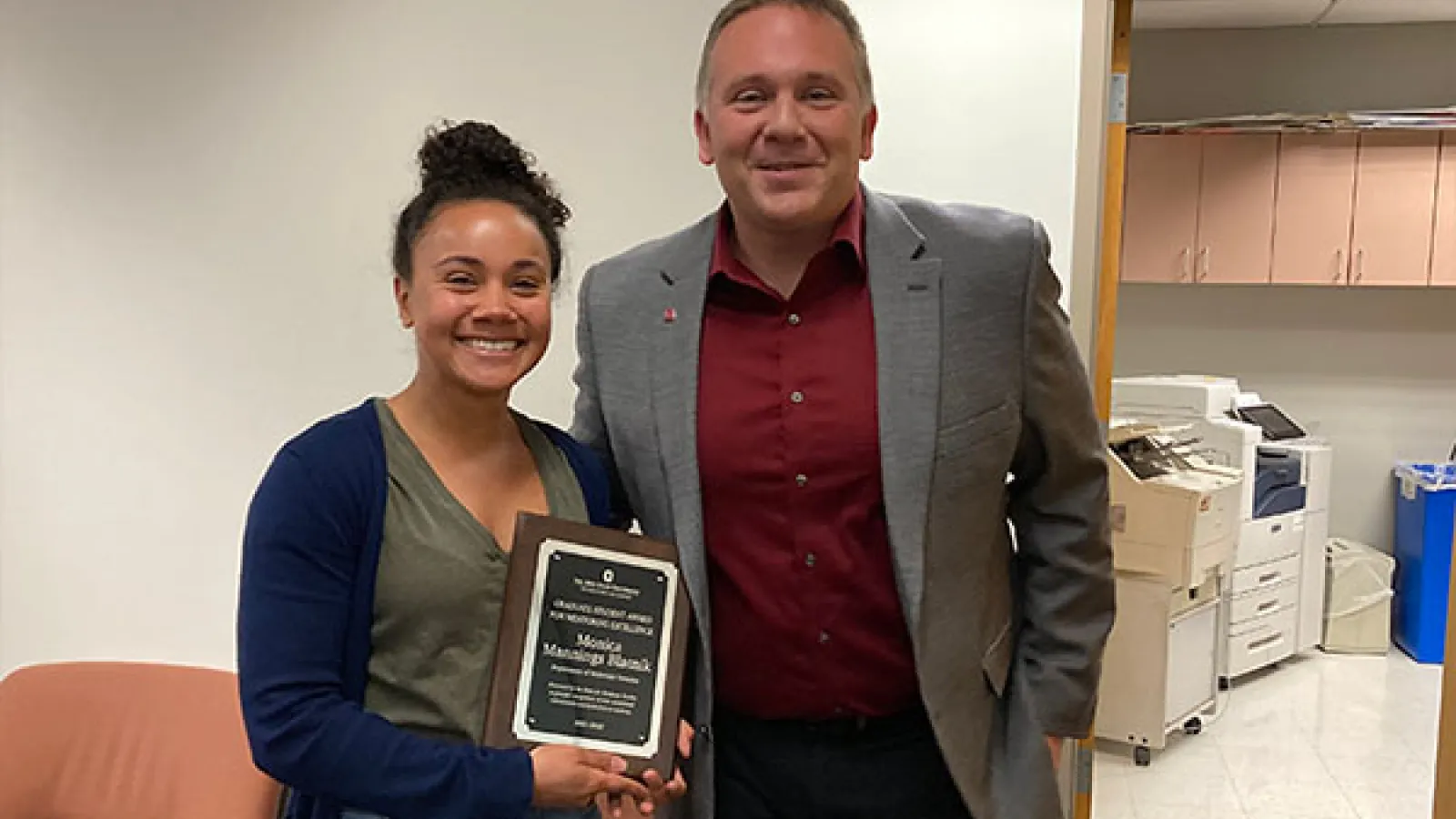 Monica Mannings Blatnik receiving award